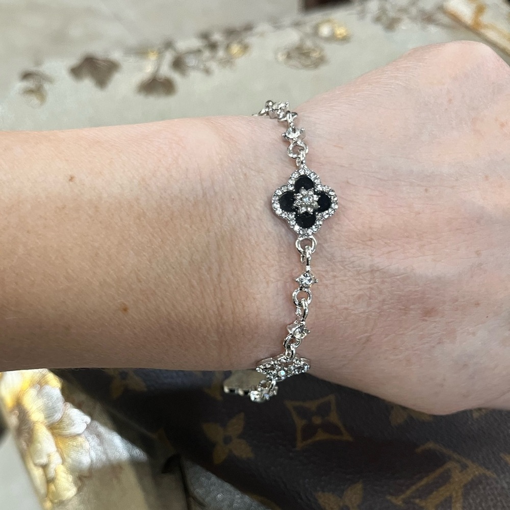 Elegant Silver and Black Floral Bracelet